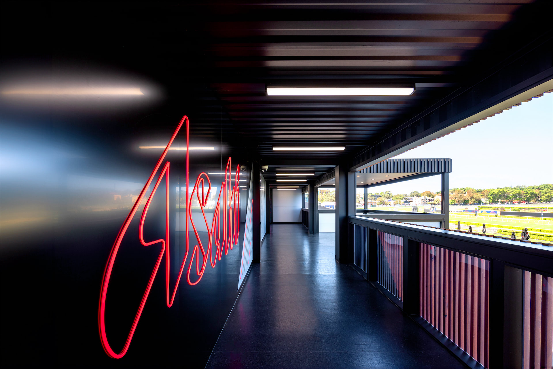 Asahi signage within the upper level of the Asahi Super Dry brand activation space for Australian Turf Club.