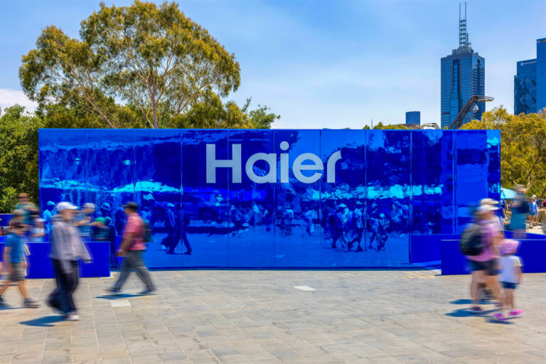 A Reflective Blue Groblox modular building for a Haier brand activation at the Australian Open 2026.