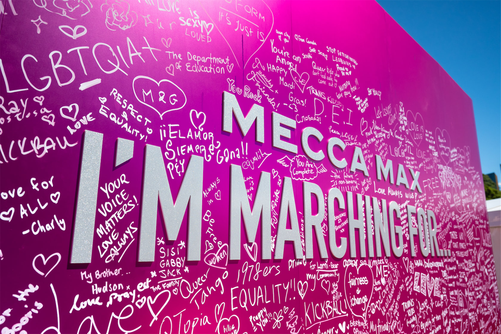 MECCA MAX Brand activation featuring an interactive message wall at the Sydney Gay and Lesbian Mardi Gras.