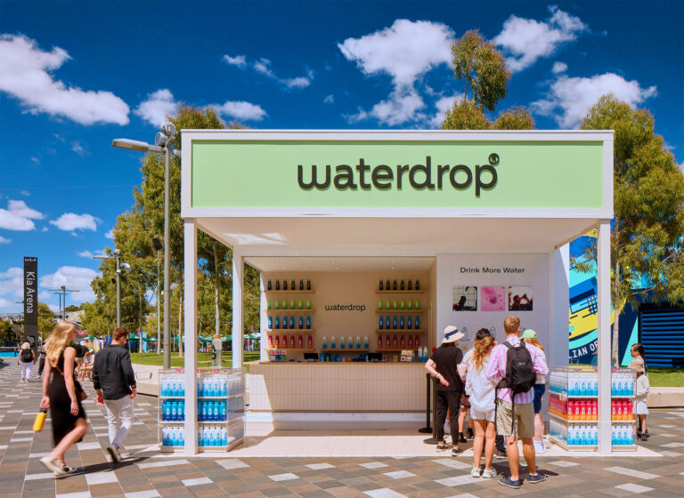 Spectators engaging with Waterdrop's modular activation area at the Australian Open.