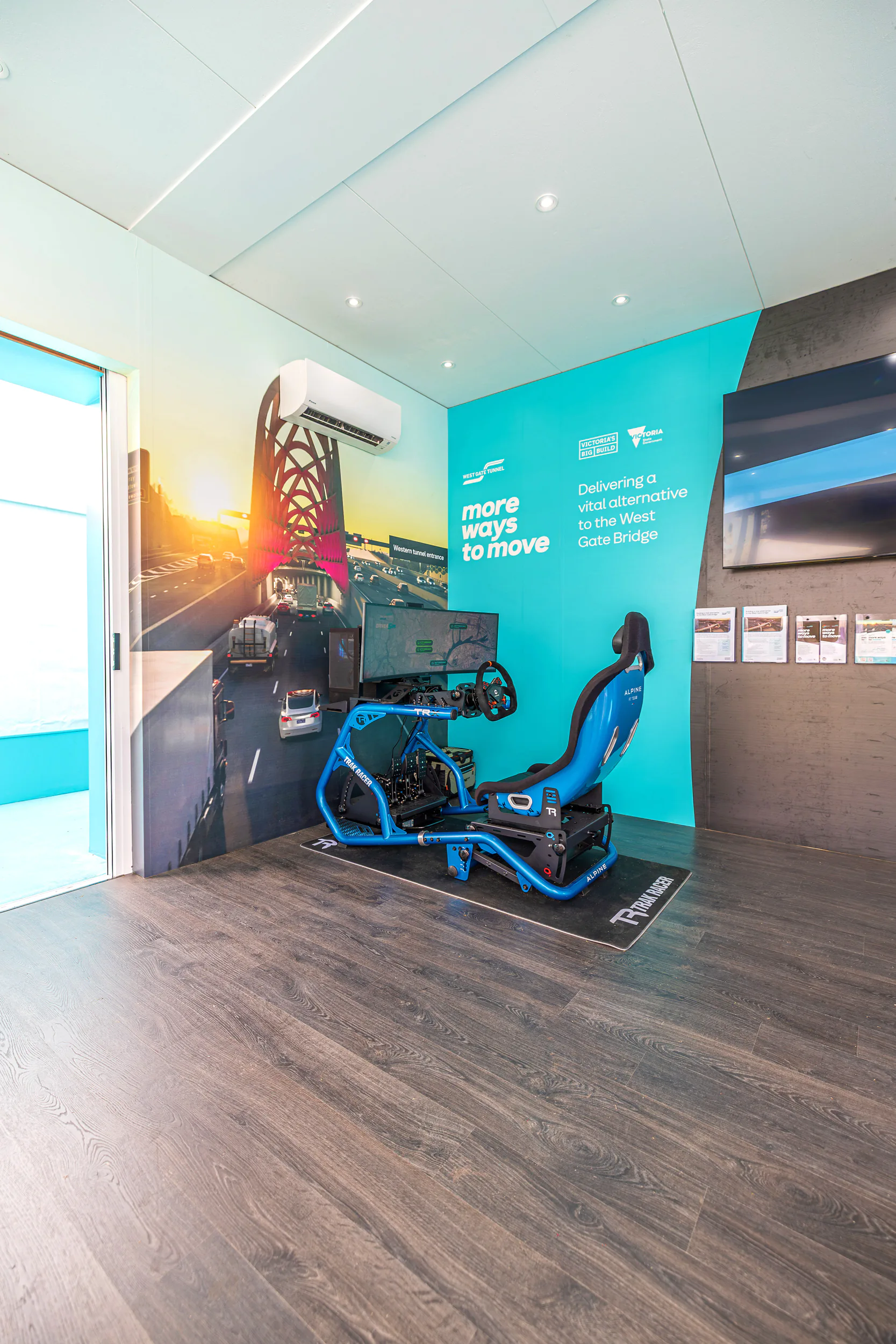 Interior of the West Gate Tunnel Project activation, complete with driving simulator, at the 2025 Formula 1® Australian Grand Prix